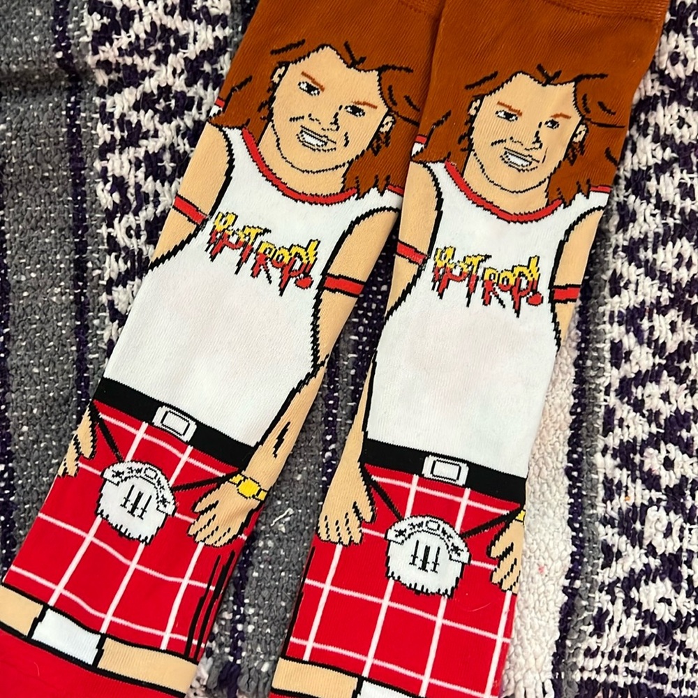 Artist socks! Never worn, purchased from a vending machine. 

Hot rod socks.
